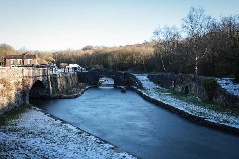 the scenic greater manchester canal walk ending with a cosy pub perfect for a winter's day