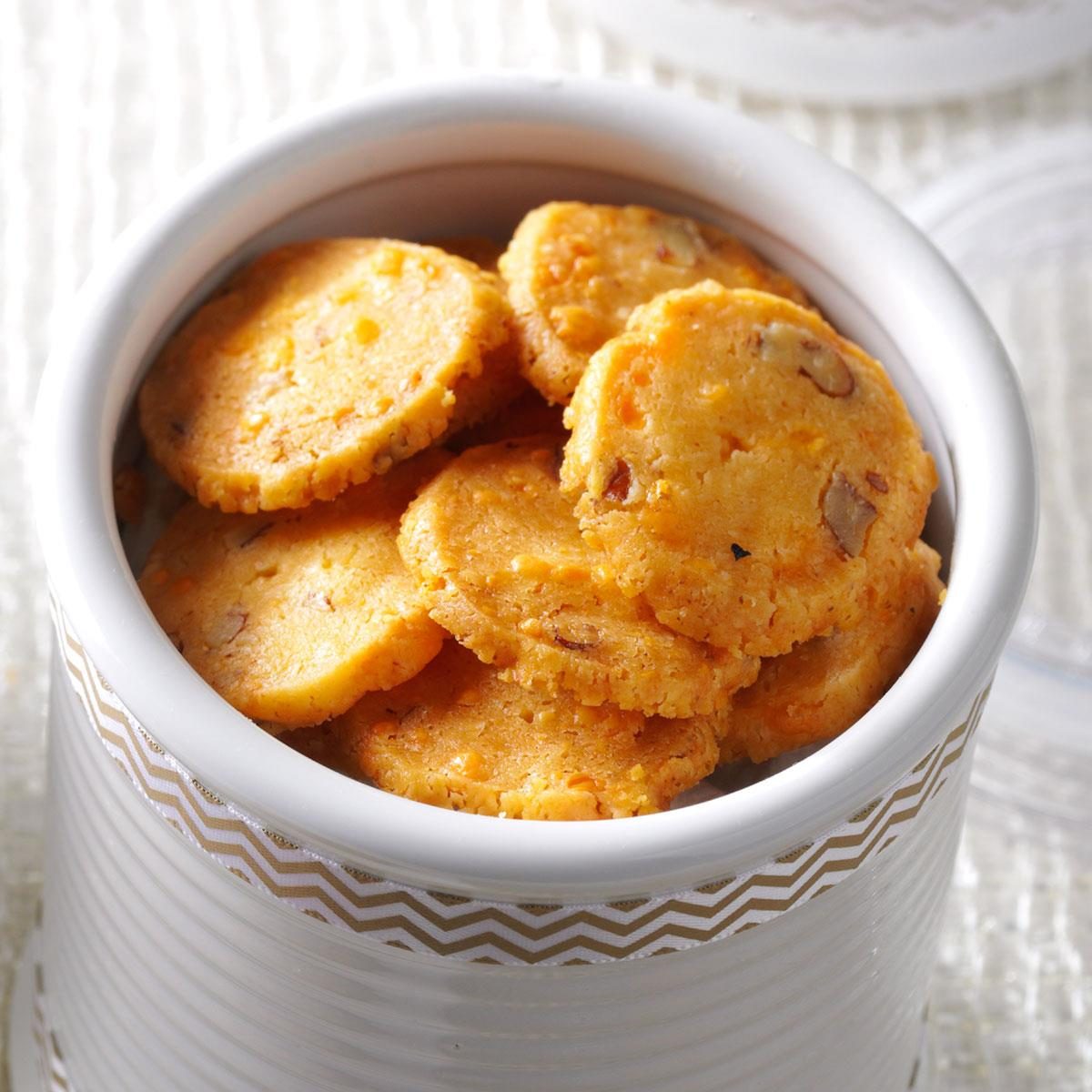 <p>Lots of holiday treats are sweet. For a change of pace, I fill goodie bags with my cheese crackers. The recipe has a large yield, but you can freeze the dough logs to bake later. —Heather Necessary, Shamokin Dan, Pennsylvania</p> <div class="listicle-page__buttons"> <div class="listicle-page__cta-button"><a href='https://www.tasteofhome.com/recipes/cheddar-pecan-crisps/'>Get Recipe</a></div> </div>