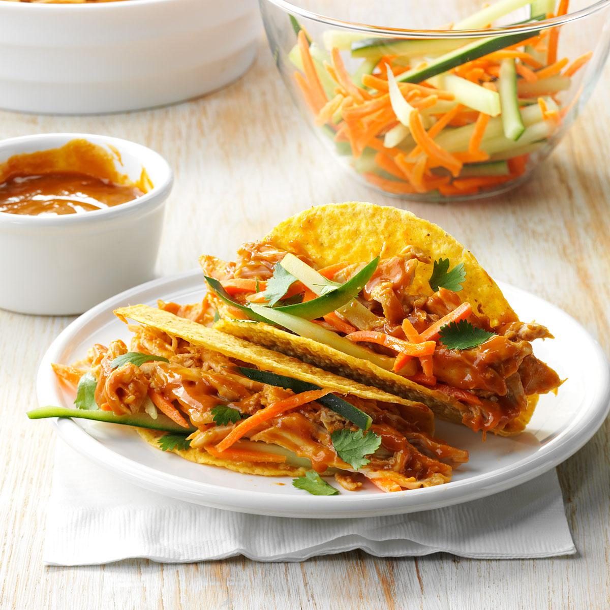 <p>Inspired by a Vietnamese banh mi sandwich, this recipe is an awesome way to use leftover chicken. If you have a little extra time, let the carrot and cucumber marinate in some rice vinegar before taco time. —Melissa Halonen, Spokane, Washington</p> <div class="listicle-page__buttons"> <div class="listicle-page__cta-button"><a href='https://www.tasteofhome.com/recipes/thai-chicken-tacos/'>Get Recipe</a></div> </div>