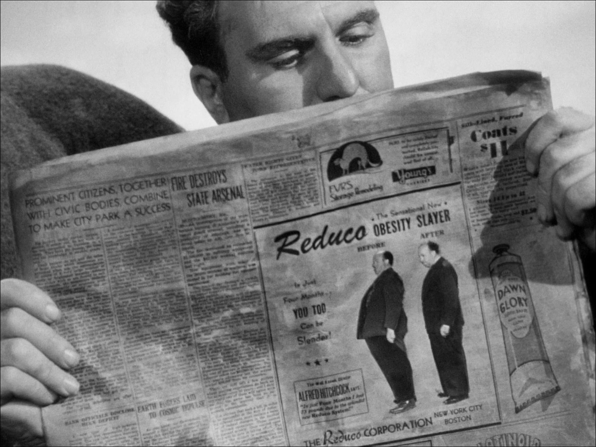 <p>This is one of the iconic Hitchcock cameos mostly because of the logistics of it. After all, this is a film about a group of people stranded on a lifeboat. How could Hitch finagle himself in? Why by having himself appear in an ad in a newspaper. Hitchcock can be seen in the before-and-after photos for Reduco Obesity Slayer.</p>