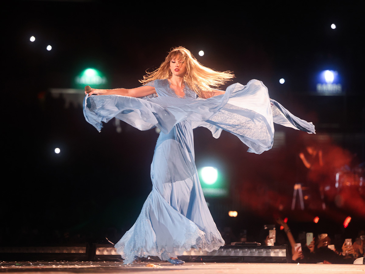 <p>Another look at the powdery blue Alberta Ferretti gown Taylor donned on the night of her <em>1989 (Taylor's Version)</em> release announcement.</p> <p>Fans have come to associate the flowy dresses with the whimsy of the <em>Folklore </em>and <em>Evermore </em>eras, but the singer switched up the color to mark the special occasion.</p>