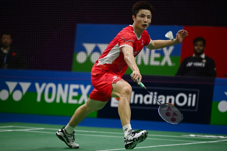 china's shi downs lee to win india open badminton