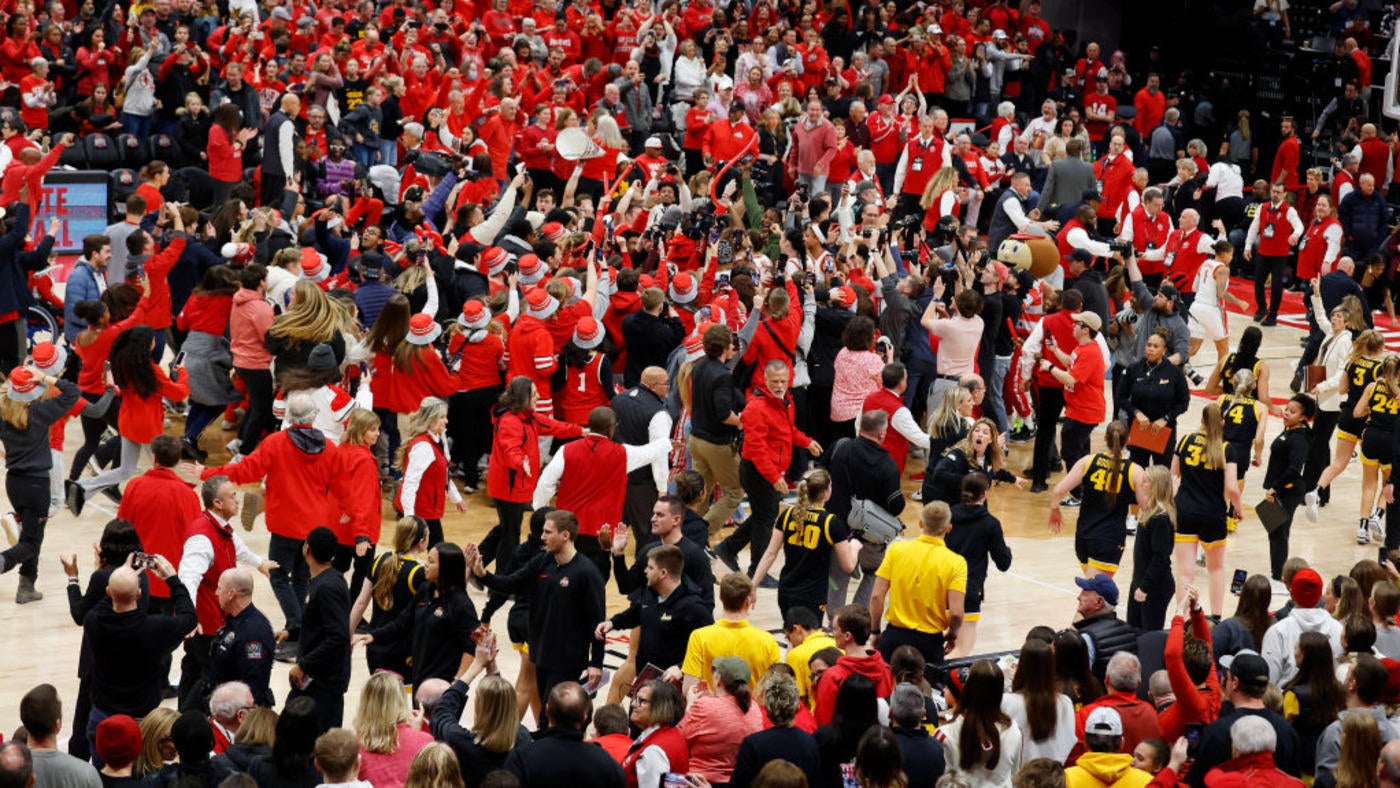 WATCH: Caitlin Clark Collides With Ohio State Fan Blindly Storming ...