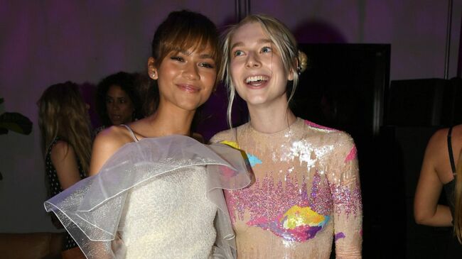 'Euphoria' Stars Zendaya & Hunter Schafer Reunite At Paris Fashion Show