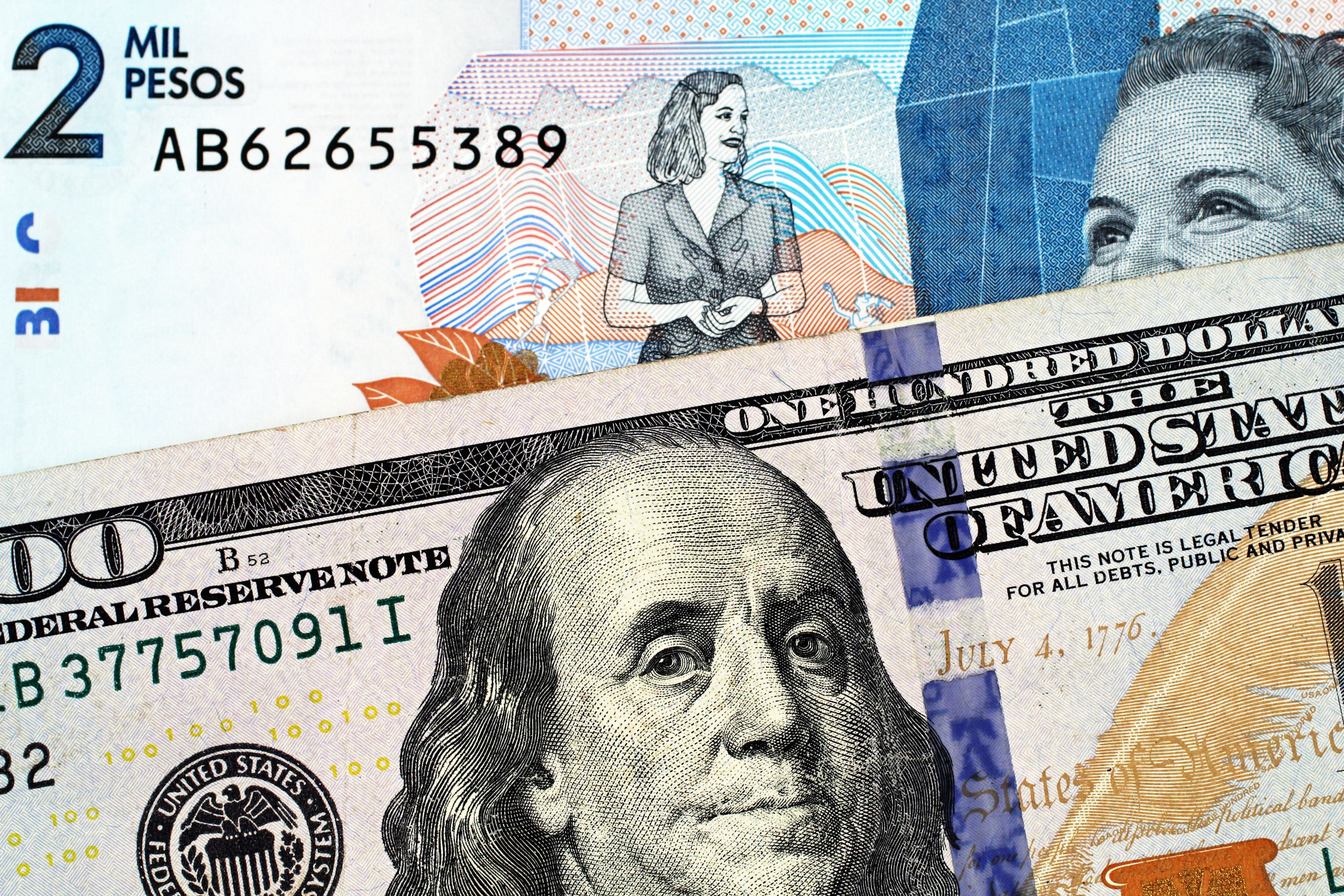 ¿cuánto son 100 dólares en pesos colombianos hoy, 13 de febrero?