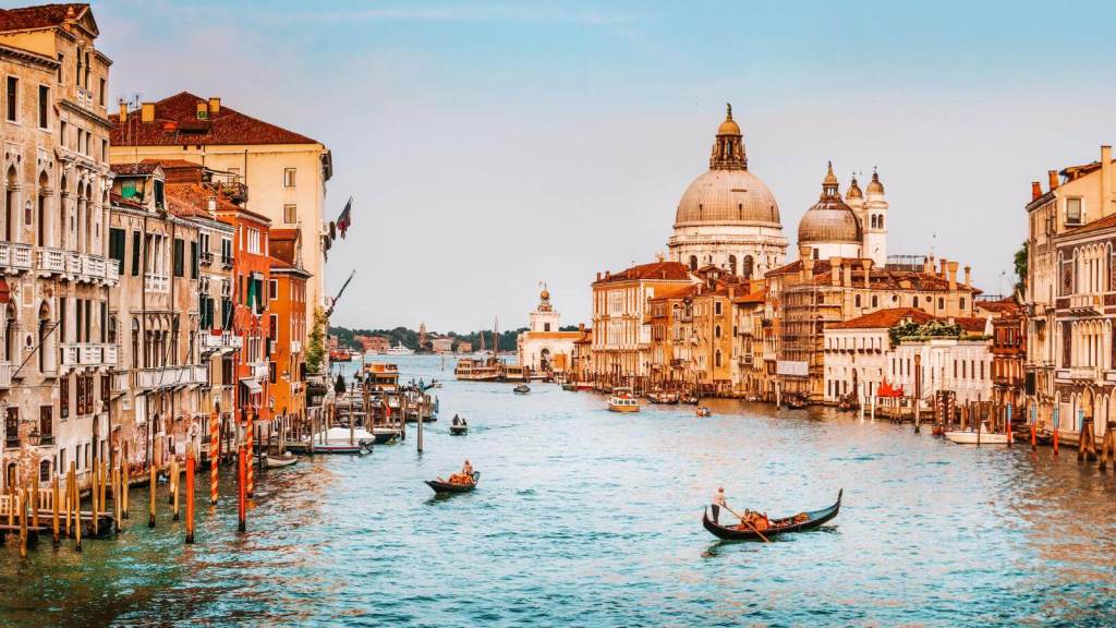 <p>Like Amsterdam, <a href="https://worldwildschooling.com/best-things-to-do-in-venice-with-kids/">Venice</a> is built on and around a network of canals, but that is where the similarities end. The Italian city has a different feel, reflecting that Dutch and Italian cultures can be worlds apart. There’s nowhere on earth quite like it, and delicious Italian food and coffee are thrown in. Go now while you can: one day, the city will sink beneath the surface, though hopefully not for a long time. </p><p class="has-text-align-center has-medium-font-size">Read also: <a href="https://worldwildschooling.com/iconic-places-around-the-world/">Iconic Places To Visit Around the World</a></p>