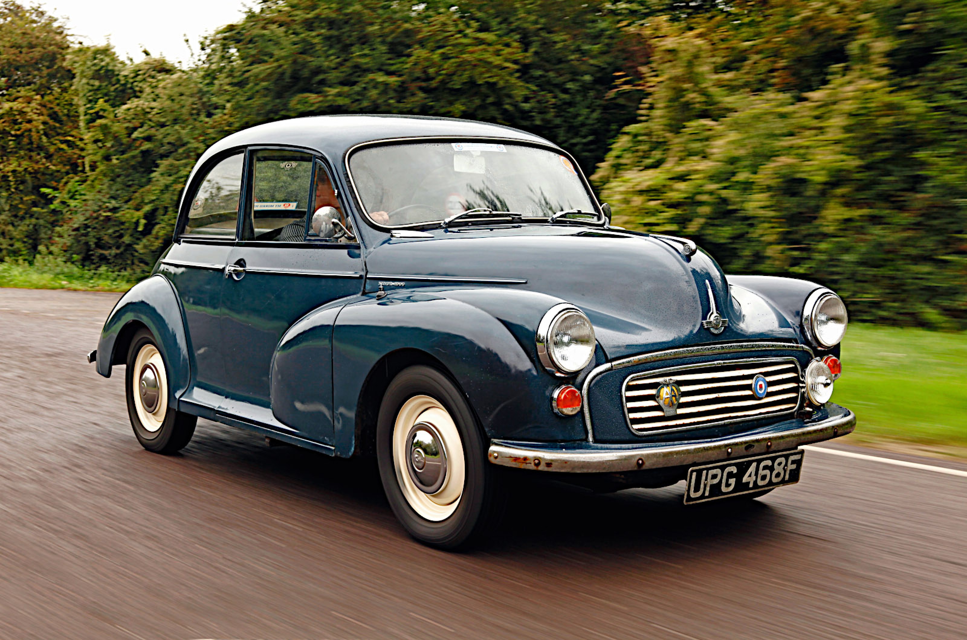 <p>Like the Peugeot 402, the Minor as launched in 1948 looks strange to us now because of the placement of its headlights.</p>  <p>These were mounted unusually low down, on either side of the radiator grille.</p>  <p>In 1951, the year before Morris was merged with Austin to form the British Motor Corporation and the Minor was substantially re-engineered, they were raised more or less to the top of the front fenders, where they remained until production ended 20 years later.</p>  <p>The body, essentially a scaled-down version of the one used for the 1948 Morris Oxford, remained the same, but the repositioned lights made it much more obvious that it had been inspired by the American cars of the early 1940s.</p>