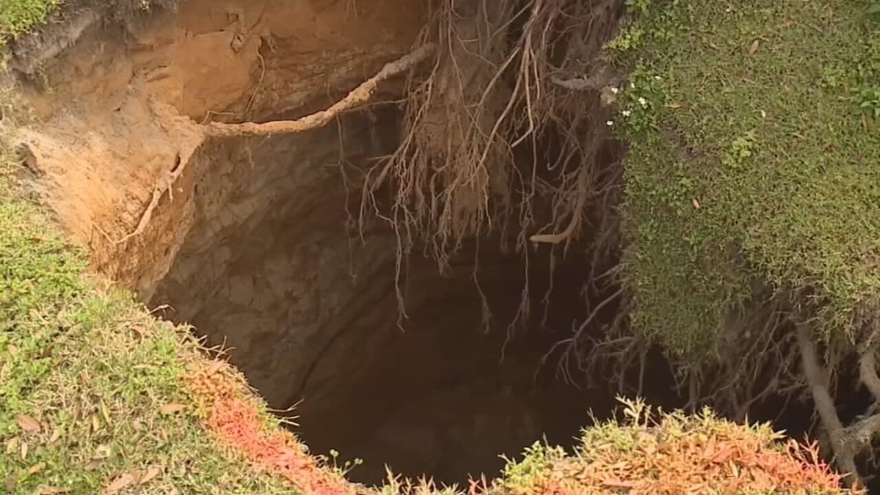 Polk County Home Evacuated After Large Sinkhole Opens In Front Yard