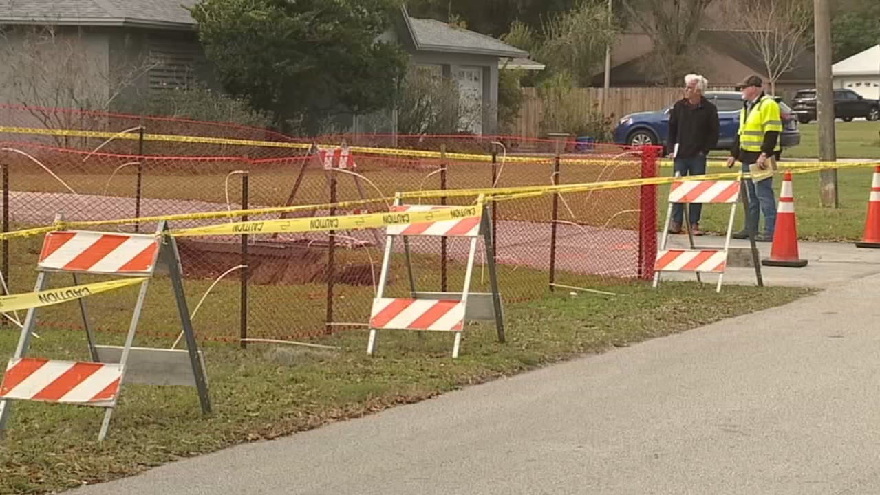 Polk County Home Evacuated After Large Sinkhole Opens In Front Yard