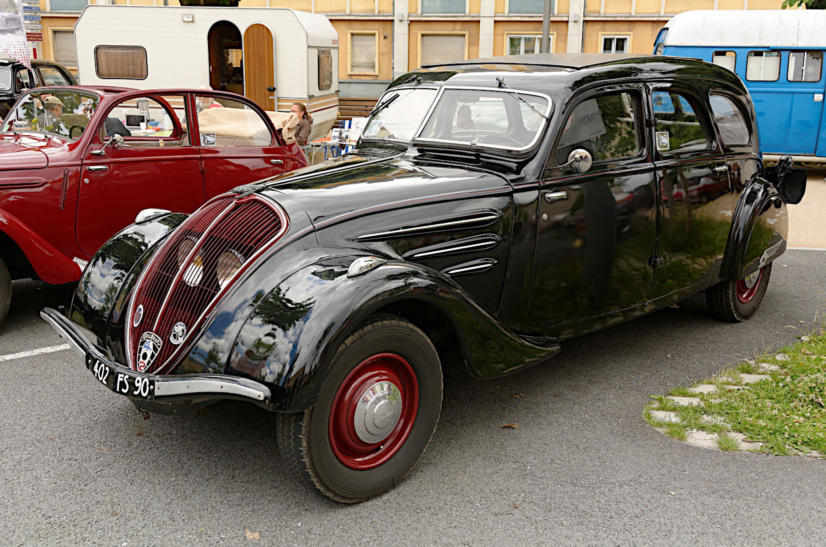 <p>The outstanding styling feature of the Peugeot 402 was the placement of its headlights behind the radiator grille.</p>  <p>Also used on the slightly later 202 and 302, but not copied by any other major auto maker, this was so strange that it’s difficult to pay much attention to anything else.</p>  <p>However, if you can drag your eyes away from the unusual lighting arrangement, and ignore the prominent chin and lack of running boards, you’ll see that the 402’s body shape is very similar to that of the much larger 1934 Chrysler Airflow.</p>  <p>The Airflow is rightly hailed as one of the first mainstream cars whose body was designed on aerodynamic principles, but the 402 shows that Peugeot was either thinking along remarkably similar lines or paying very close attention to what was happening on the other side of the Atlantic Ocean.</p>