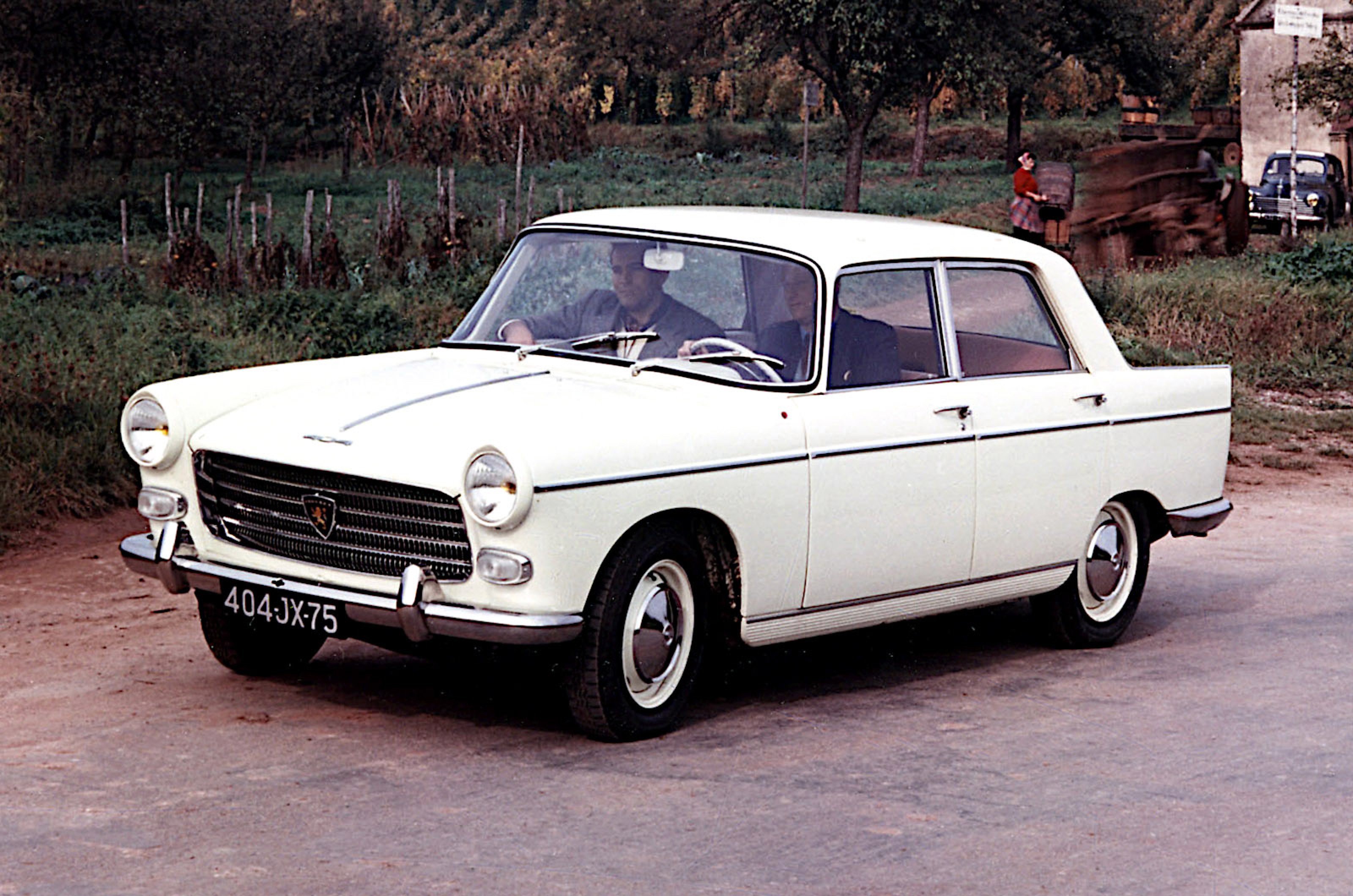 <p>Although there were coupe, cabriolet, station wagon and pick-up versions of the 404, the sedan in particular looked so much like the BMC Farina models introduced in 1959 that anyone not familiar with cars of that era would have difficulty telling them apart.</p>  <p>This was not coincidental, since all of them were designed by Pininfarina, which had done well to attract so much business with one basic shape.</p>  <p>As with the BMC cars, the most obvious American feature of the 404 was its pair of tailfins, which were mounted significantly higher than the trunklid and ended at the top of a set of vertical rear lights.</p>  <p>Unlike BMC, Peugeot persevered with the same shape for the lifetime of the car, and did not reduce the size of the fins.</p>
