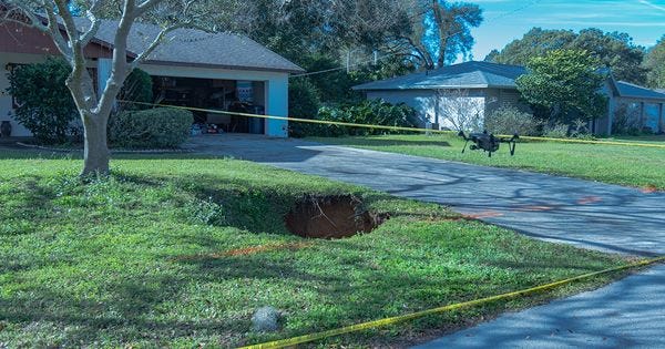 60-feet Sinkhole Opened In Florida Front Lawn, Leaving Neighbors Nervous