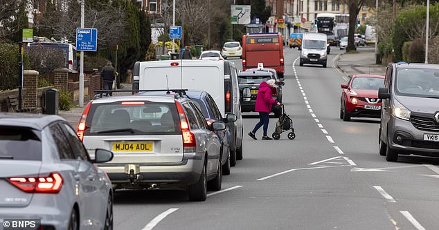 millionaire's playground sandbanks is hit by traffic gridlock as cars are stopped from taking shortcut in favour of cyclists