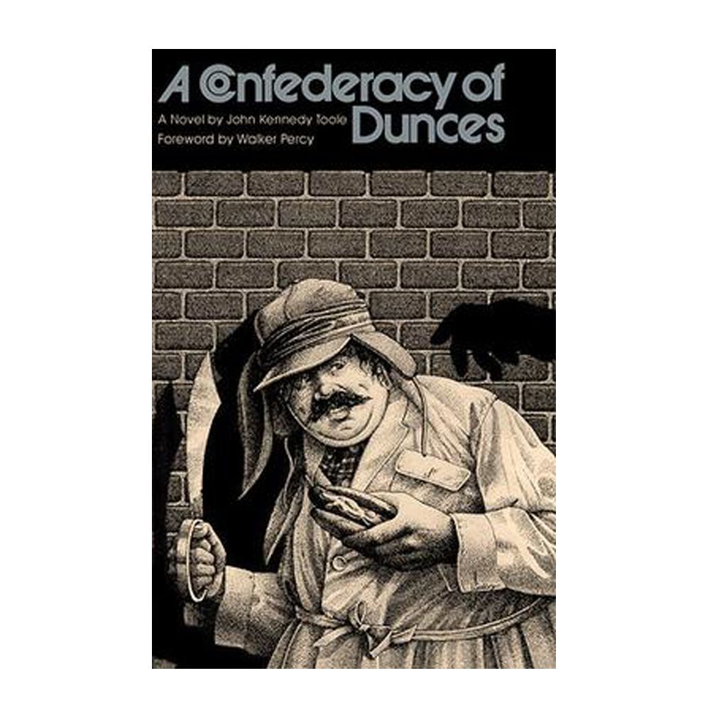 <p><strong>Genre:</strong> Fiction</p><p>Posthumously published after author John Kennedy Toole committed suicide in 1969, <em>A Confederacy of Dunces</em> quickly became a cult classic, winning the Pulitzer Prize for Fiction in 1981. </p><p>The comedy centers around the life of Ignatius J. Reilly, a 30-year-old living at home with his mother in New Orleans who finds adventure while in search of employment.</p><p><strong><a class="body-btn-link" href="https://www.amazon.com/Confederacy-Dunces-John-Kennedy-Toole/dp/0802130208?tag=syndication-20&ascsubtag=%5Bartid%7C10055.g.46573217%5Bsrc%7Cmsn-us">Shop Now</a></strong></p>