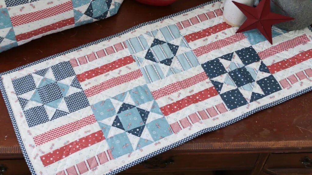 <p>This is the loveliest <a href="https://www.diaryofaquilter.com/stars-stripes-pillow-and-runner-tutorial/" rel="noreferrer noopener">patriotic table runner</a> I have ever seen! The pattern is really easy with just stars and stripes.</p>