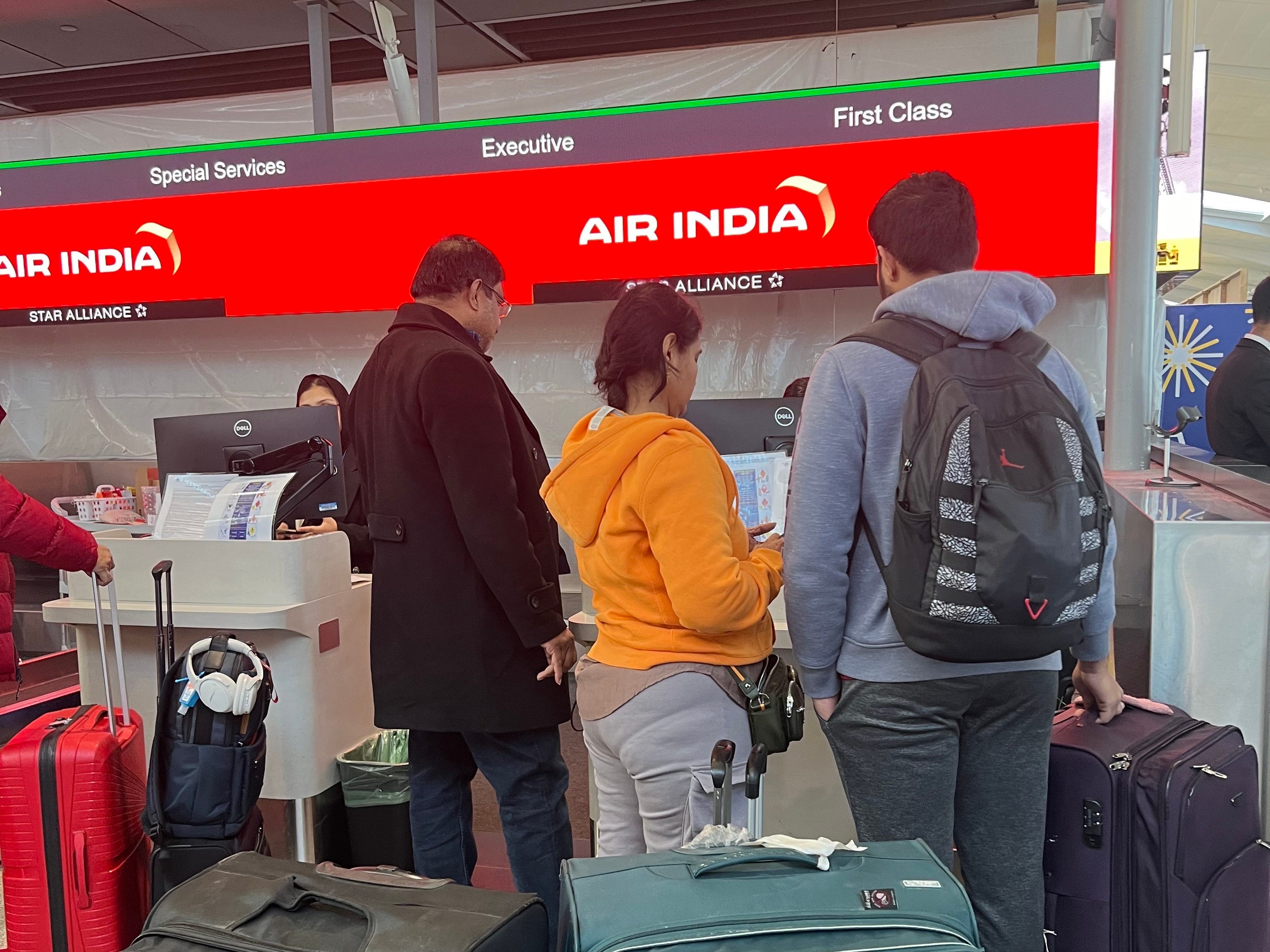 <p>A long line of economy travelers queued with mountains of luggage, so I'd budget extra time for check-in if you cannot get your boarding pass on the app or need to check bags.</p>