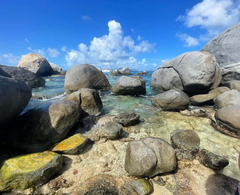 <p>Although Norman Island is one of the closest to the main island of Tortola, the only way to arrive ashore is via private boat. As there are no public ferries, only those on a BVI sailing excursion or booking a tour can explore the underwater wonders here.</p><p>Around the bend from the famed Willi-T’s floating bar, three open caves recess into darkness on the island’s western edge. Abundant marine life darts along the walls, and larger fish can be seen hiding in the ravines, waiting for prey to swim within their reach. Sea turtles may also leisurely swim right by you.</p><p>While visiting the British Virgin Islands, be sure and explore the <a href="https://www.flannelsorflipflops.com/virgin-gorda-baths/">Virgin Gorda Baths</a>!</p>