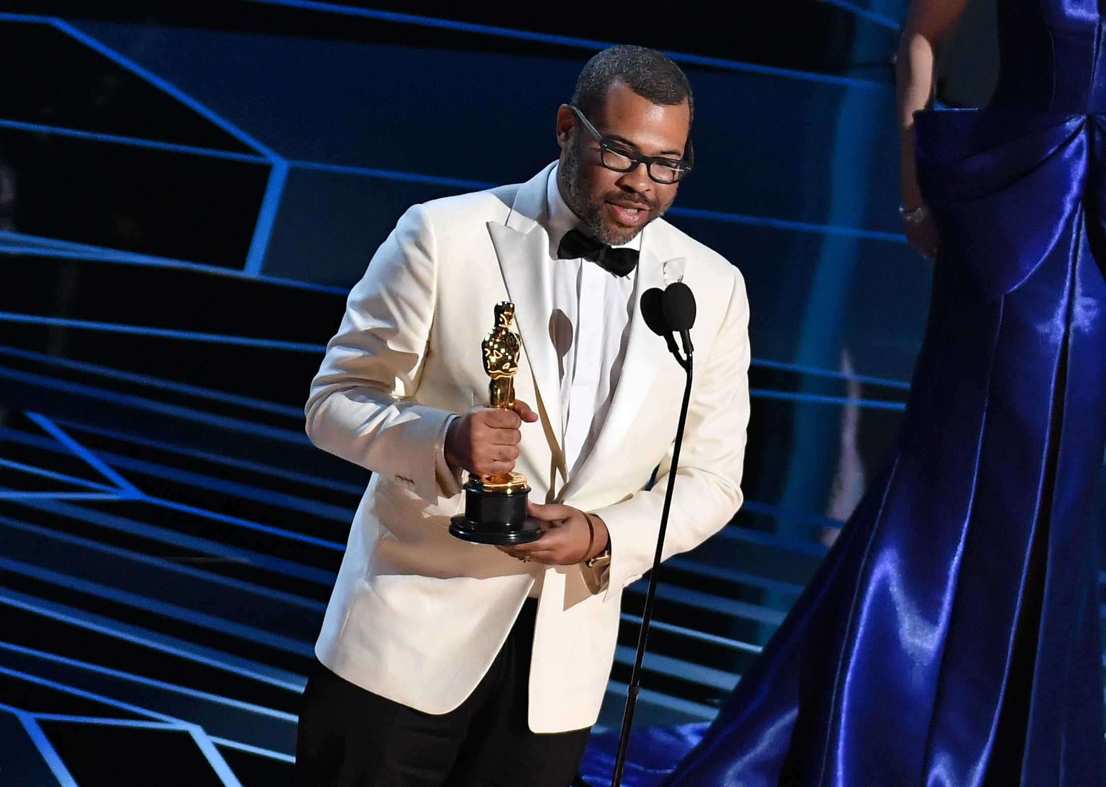 <p>Jordan Peele became the first Black screenwriter to win the Academy Award for best original screenplay when he took home the Oscar for his "Get Out" script during the <a href="https://www.wonderwall.com/awards-events/red-carpet/2018-academy-awards-see-all-stars-red-carpet-3013009.gallery">90th Annual Academy Awards</a> on March 4, 2018.</p><p>Barry Jenkins and Tarell Alvin McCraney won in the best adapted screenplay category in 2017 for "Moonlight," while John Ridley won in 2014 for adapting "12 Years a Slave." </p><p>Geoffrey Fletcher, meanwhile, became the first Black writer to win an Oscar for writing -- period -- when he took home the best adapted screenplay Oscar for "Precious" in 2010.</p>