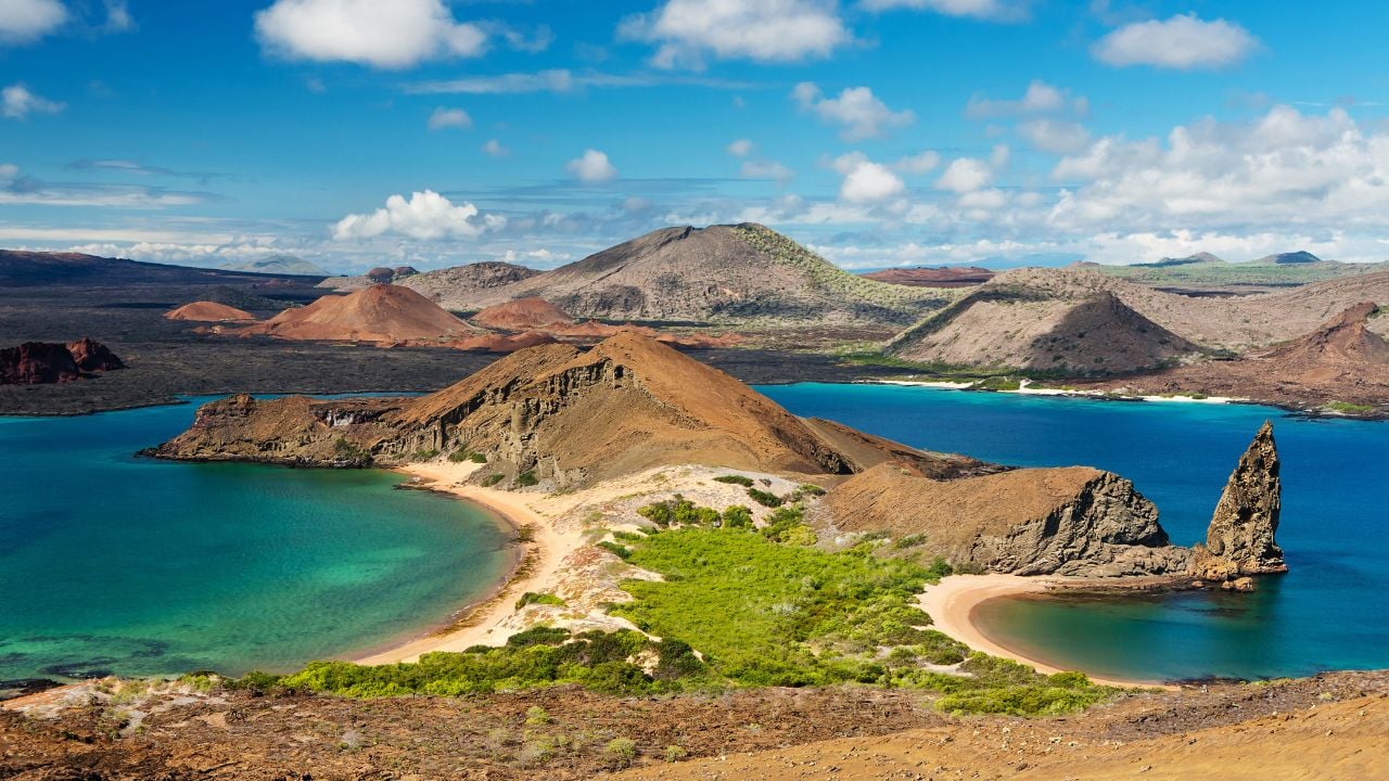 <p>As perhaps the world’s most famous UNESCO World Heritage Site, over 90% of the Galápagos Islands—spanning more than 600 miles of the mainland Ecuadorian coast—consists of national parkland. </p><p>Ever since Charles Darwin visited these islands in 1835 and launched his exploration into evolutionary science, the Galápagos have wowed travelers with the vast array of wildlife that call these islands home, including marine iguanas, giant tortoises, sharks, penguins, and mockingbirds. </p><p>While it can be difficult for visitors to reach the Galápagos, that’s for a good reason: The Ecuadorian government remains proactive in preventing over-tourism and preserving what’s become the world’s ultimate living museum. </p>