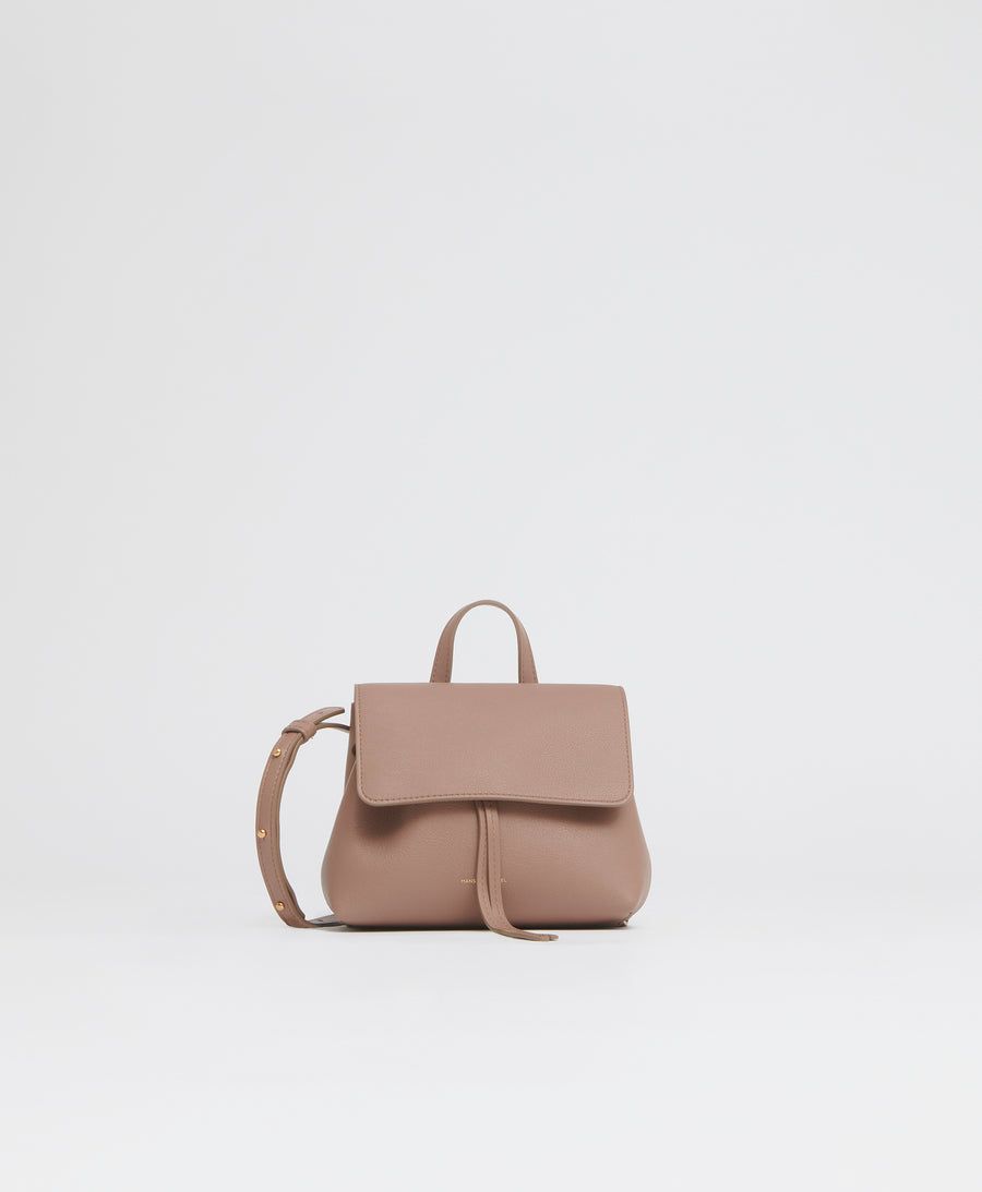 <p><strong>$495.00</strong></p><p><a href="https://go.redirectingat.com?id=74968X1553576&url=https%3A%2F%2Fwww.mansurgavriel.com%2Fproducts%2Fmini-soft-lady-bag-biscotto&sref=https%3A%2F%2Fwww.townandcountrymag.com%2Fstyle%2Ffashion-trends%2Fg44518138%2Fbest-crossbody-bags-for-travel%2F">Shop Now</a></p>