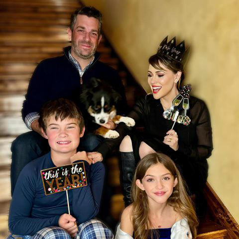 Alyssa Milano Instagram Alyssa Milano, David Bugliari, and their kids Milo and Elizabella.
