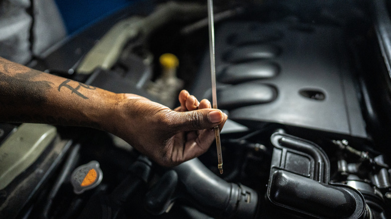 The Average Cost Of An Oil Change (And How To Know If You're Being Scammed)