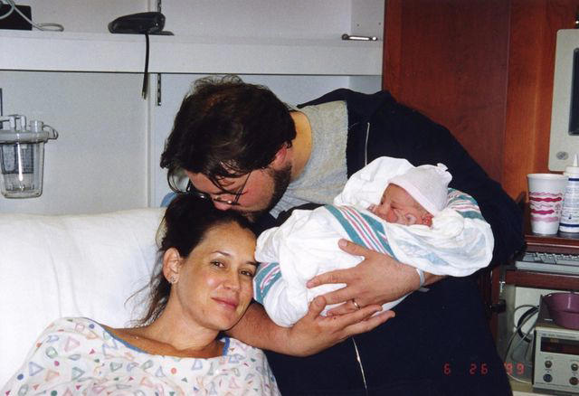 Kevin Smith Instagram Kevin Smith and Jennifer Schwalbach Smith with their newborn baby in 1999.