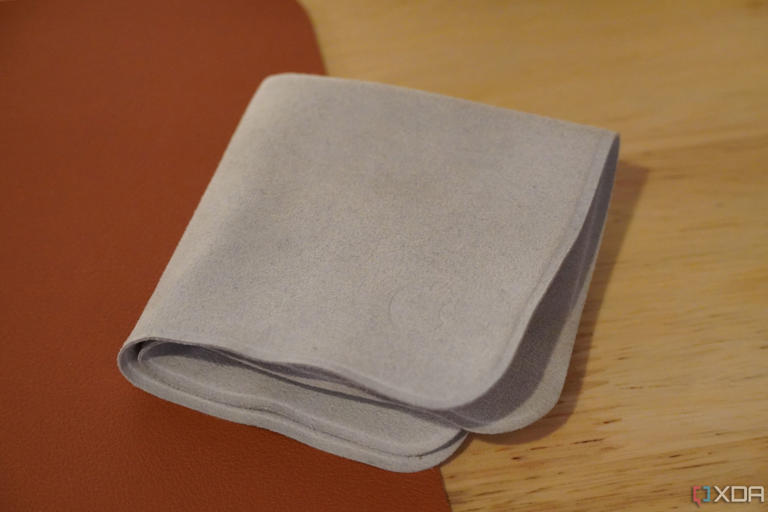 An Apple Polishing Cloth on a desk.