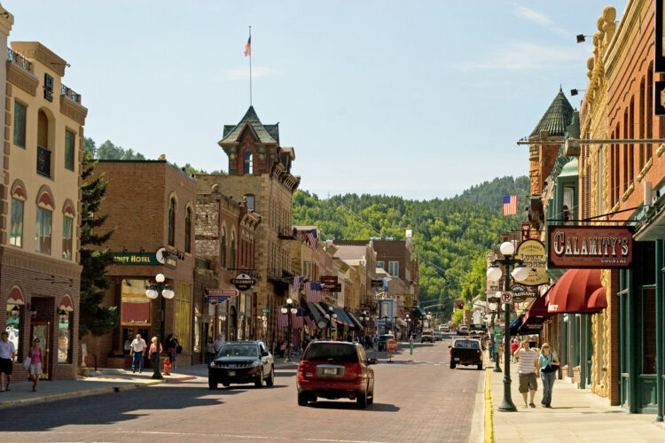 You can get the feeling of the old west without having the hardships in Deadwood. The old-timey saloons and shops are a lot of fun since they push the history and the culture, and for the single traveler, it’s a chance to have a lot of fun.