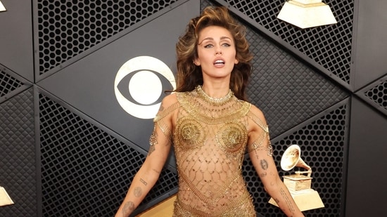 Grammy Awards 2024: Miley Cyrus Bares It All In Gold Maison Margiela ...