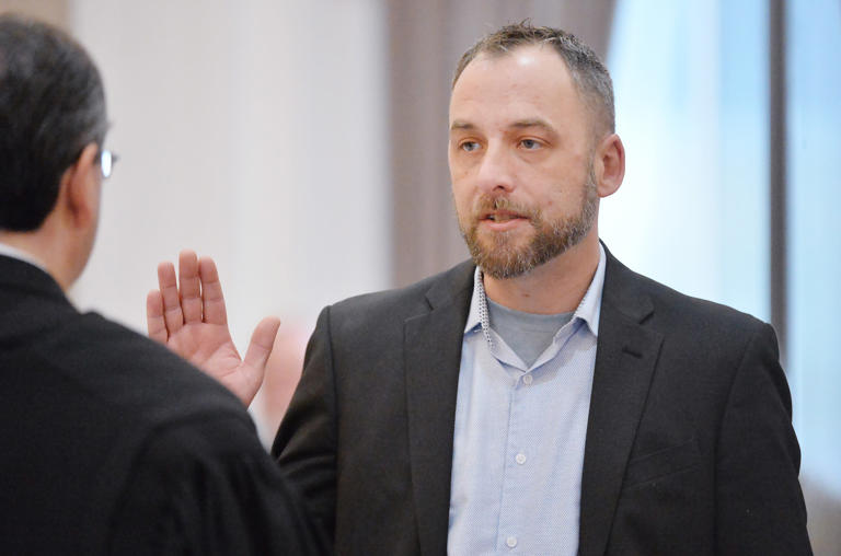Rock Copeland is sworn in as a member of Erie County Council during the swearing-in ceremony of judicial and county elected officials inside courtroom H at the Erie County Courthouse in Erie on Jan. 2, 2024.