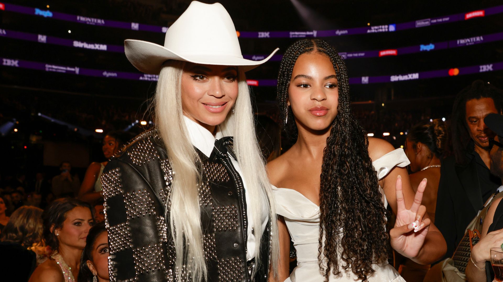 Beyoncé Turns Heads In Leather Cowgirl Mini Skirt With Lookalike ...