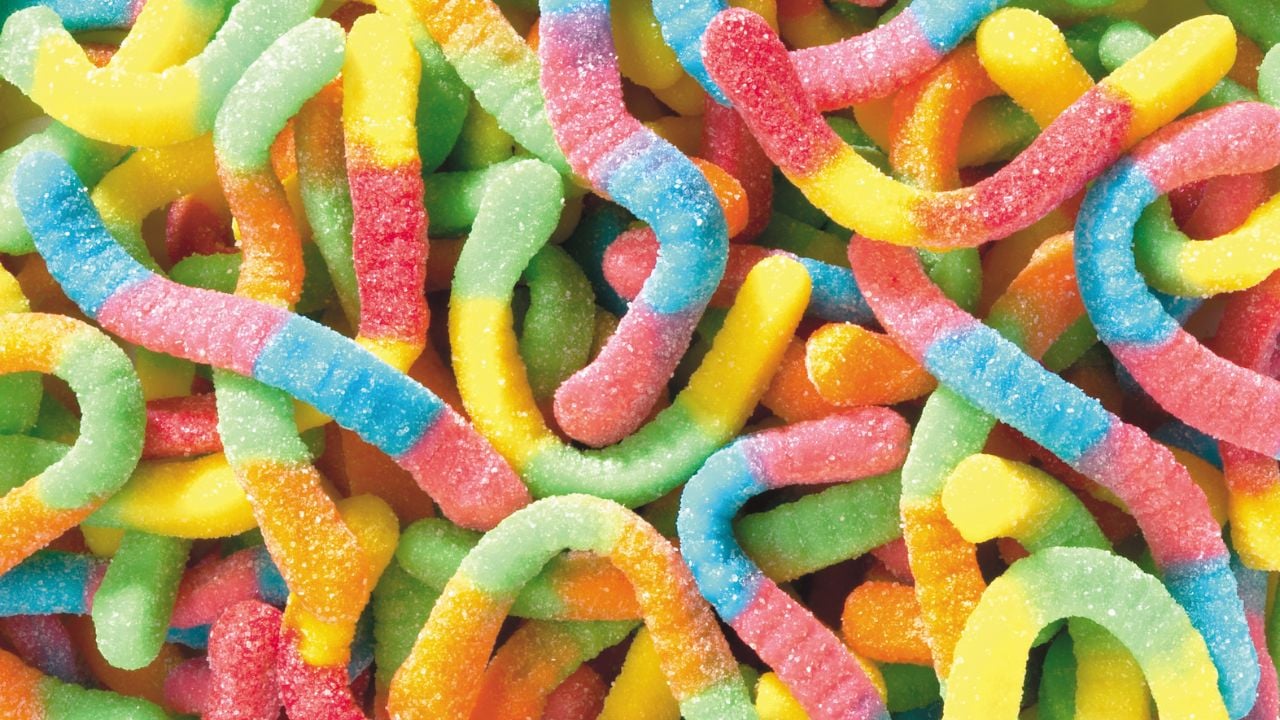 <p>Sour gummy worms intrigue the part of the population that enjoys the sting of sour sugar dancing atop candy, causing facial winces and visceral reactions. For those who appreciate sour candy’s acidic bite, sour gummy worms prove their worth.</p>