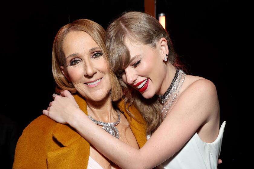 Taylor Swift and Céline Dion make up backstage after awkward Grammy handoff