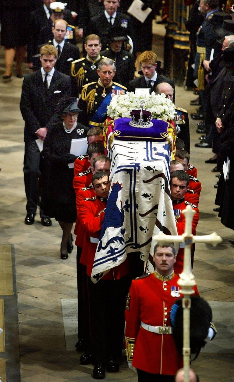 The royal family follows the Queen Mother's coffin out of Westminster Abbey after her funeral service (AFP/Getty)
