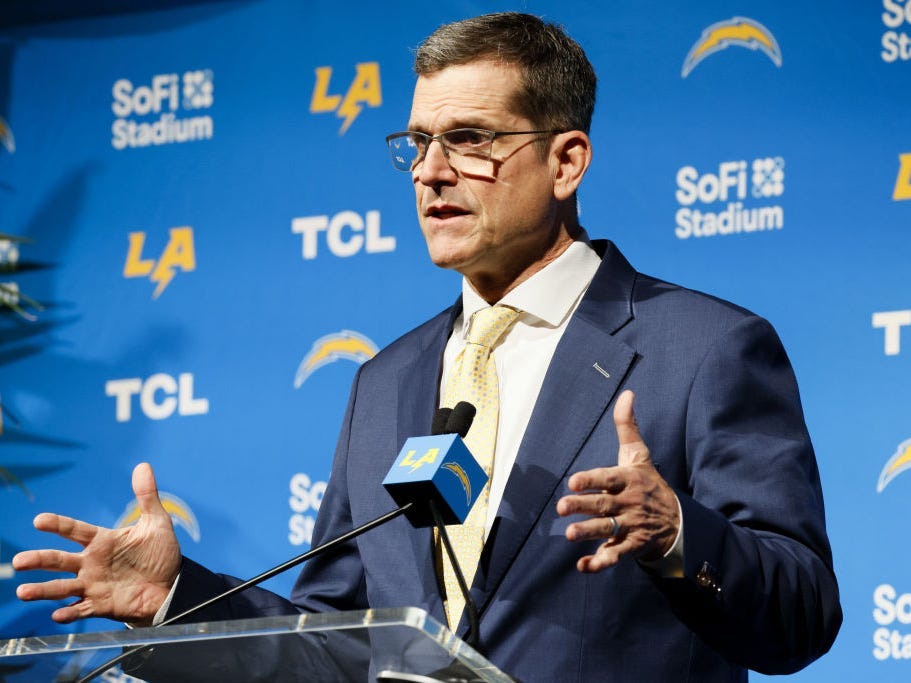 jim harbaugh's new contract will pay him more than his brother and all but three of his chargers players next season