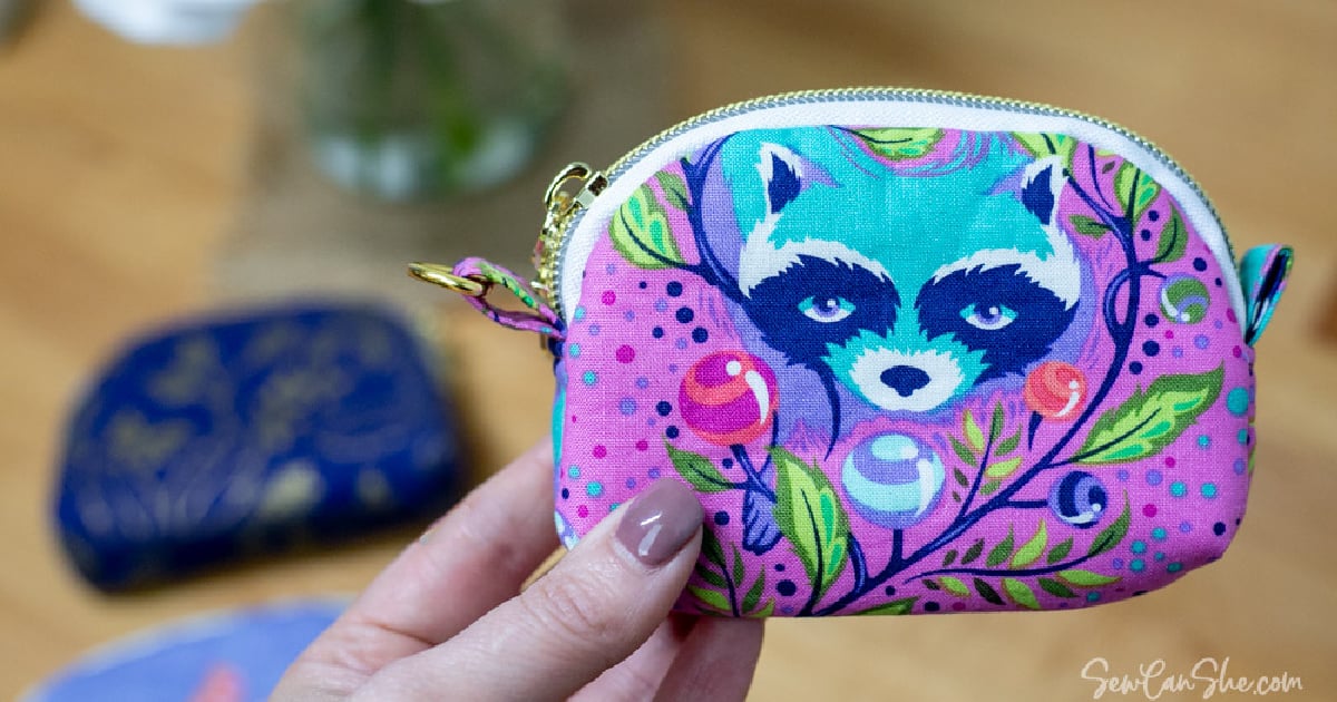 <p>You have so many options when sewing this DIY <a href="https://sewcanshe.com/sew-the-cutest-coin-purse-pattern-with-a-zipper/" rel="noreferrer noopener">zippered coin purse</a>. Make one with leftover fabrics and no extra hardware or fussy cut a cute motif from your fabric like this pink Tula Pink raccoon pouch.</p><p>Pro tips: I love all the new <a href="https://www.amazon.com/s?k=handbag+zippers&language=en_US&crid=2NSPTFYVBFVEE" rel="noreferrer noopener nofollow">handbag zippers</a> you can get on Amazon now with pretty zipper pulls! This pouch has fusible interfacing to help it hold that cute shape.</p>
