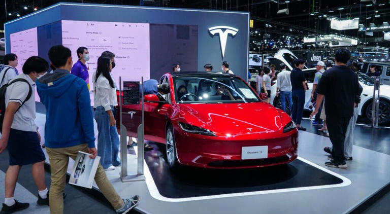 Cathie Wood's Ark Says Tesla's Total Addressable Market Will Jump ...