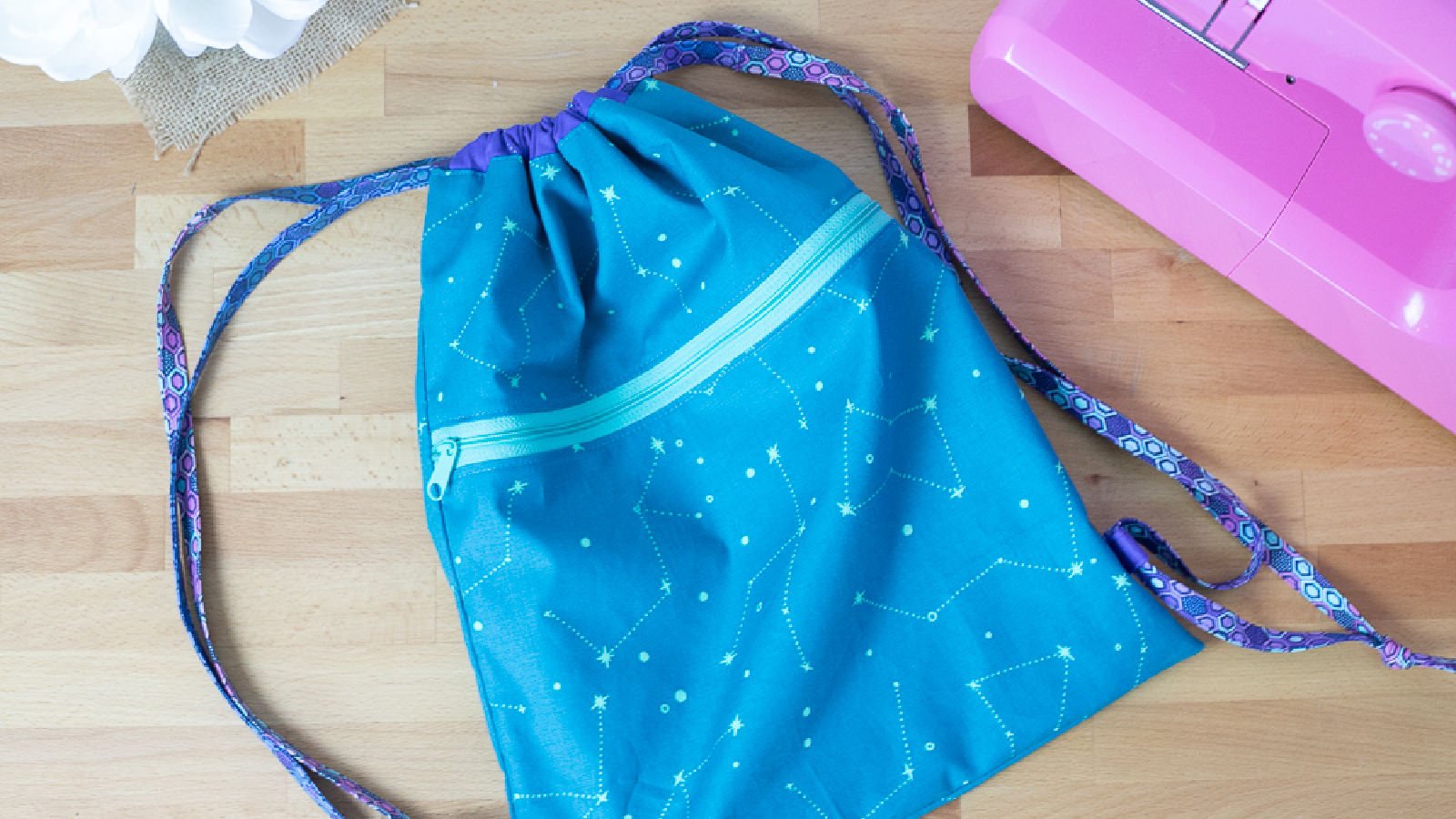 <p>My kids are teenagers and young adults, but they still love the drawstring backpacks I make. This <a href="https://sewcanshe.com/easy-peasy-backpack-with-a-zipper-pocket-free-tutorial/" rel="noreferrer noopener">backpack with a zippered pocket</a> is especially handy for travel.</p>
