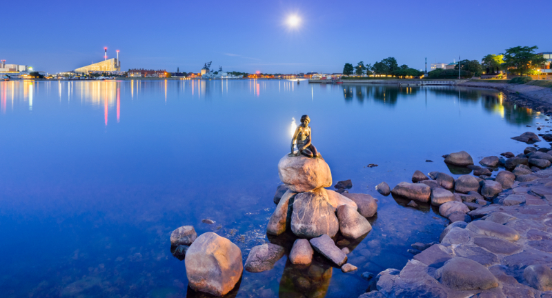<p>Copenhagen’s famous Little Mermaid statue is often noted for being much smaller than expected, leading to disappointment. Crowds can make it hard to get a good view or photograph of the statue. Additionally, its small size and simplicity might not justify the effort of visiting.</p>