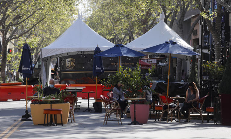 PALO ALTO, CALIFORNIA - MARCH 30: Outdoor dining along University Avenue in downtown Palo Alto, Calif., on Tuesday, March 30, 2021.