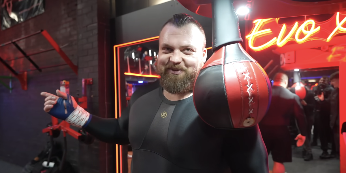 Watch A Strongman Try To Hit Harder Than A UFC Champion