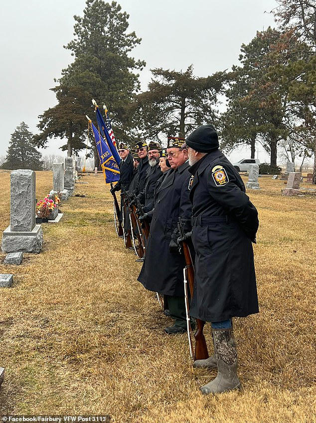 Heartwarming moment dozens of strangers in military regalia gather