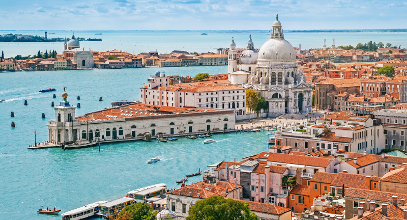 <p>Venice, known for its iconic canals, is suffering from over-tourism, leading to environmental degradation and the city slowly sinking. The narrow streets often get overcrowded, diminishing the serene experience many seek. Additionally, the high tourist influx has inflated prices, making it less affordable for many travelers.</p>