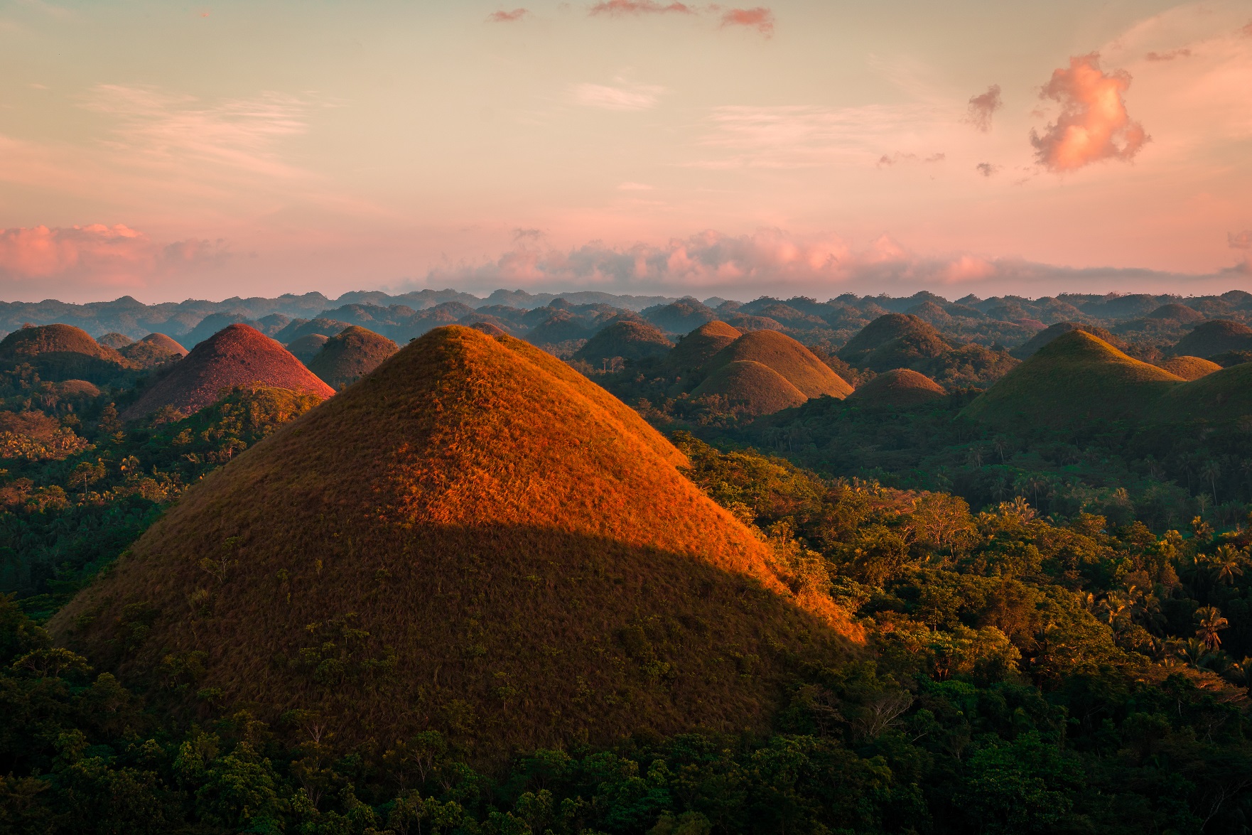 <p>The hills got their name from their appearance. In the dry season, the grass on the hills turns brown, making them look like gigantic chocolate truffles.</p>