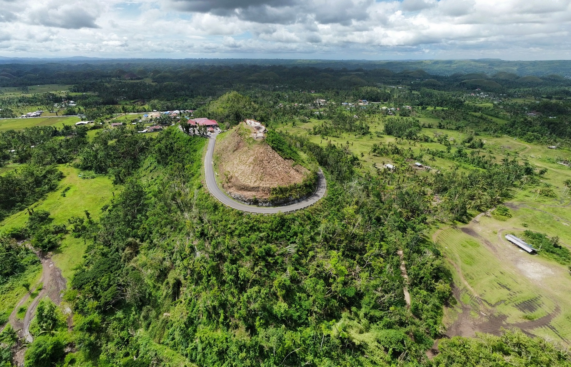 <p>The giants spent days throwing mud balls at each other until they finally started fist-fighting. In the end, the giants knocked each other down and both met their end that day. The remains of the mud balls that they’d thrown are said to have become the Chocolate Hills.</p>
