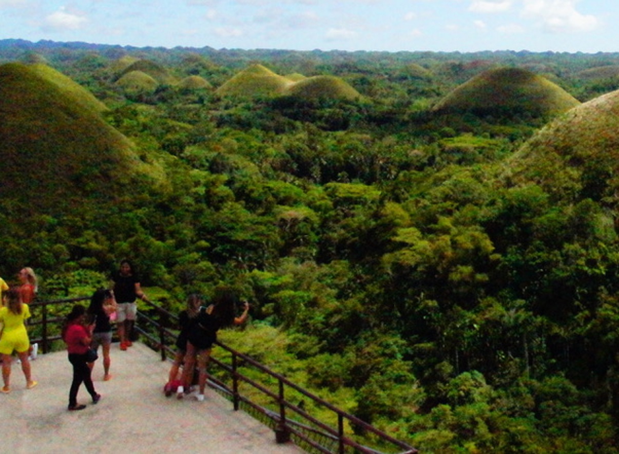 <p>While the days of guerilla combat are over in Bohol, the Chocolate Hills are still under attack.</p>  <p>Philippines’ Department of Environment and Natural Resources (DENR) are tasked with protecting the region, but in recent years, they’ve contributed to the <strong>mining and quarrying operations</strong> that threaten the Chocolate Hills.</p>