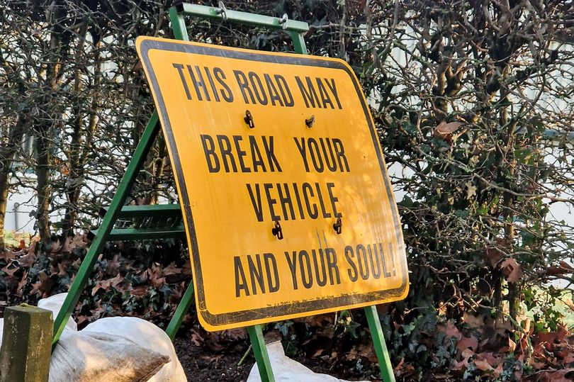 fuming local drivers slam 'diabolical' potholes as one road has 174 craters
