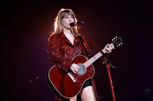 Taylor Swift performs onstage for the opening night of The Eras Tour | Getty Images | Photo by Kevin Winter