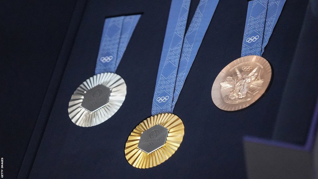 Paris 2024 Medals To Include Eiffel Tower Metal